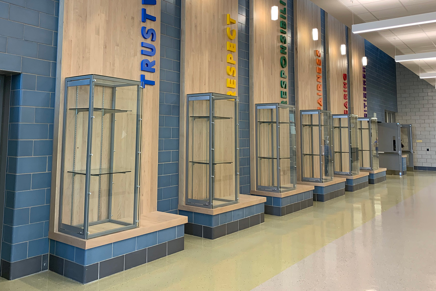 Glass display cases with core values display