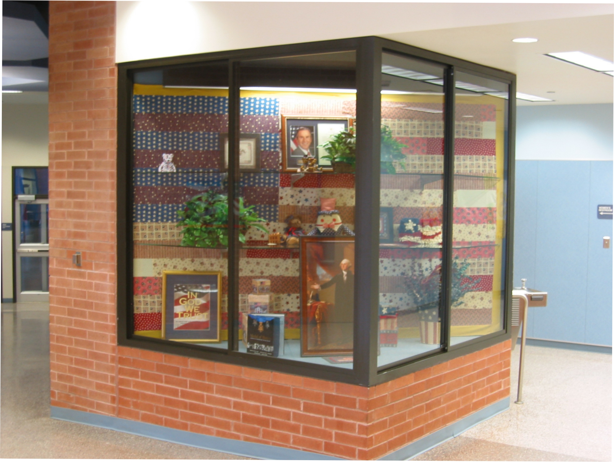 Memorial glass display case in lobby
