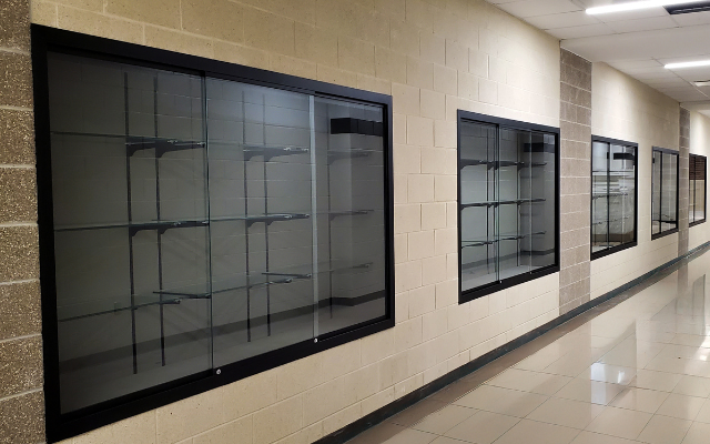 Image of several display cases in a hallway